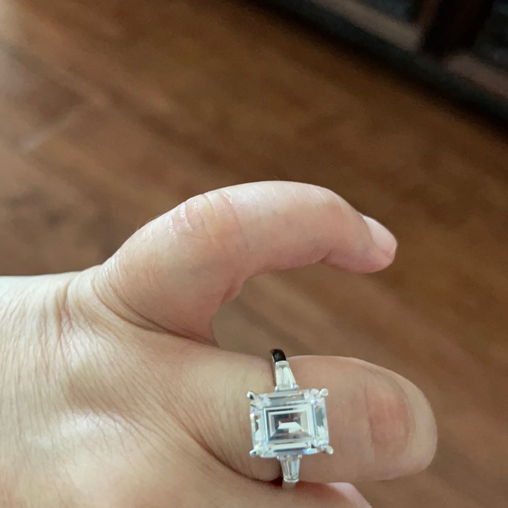 Emerald Moissanite with tapered baguette ring